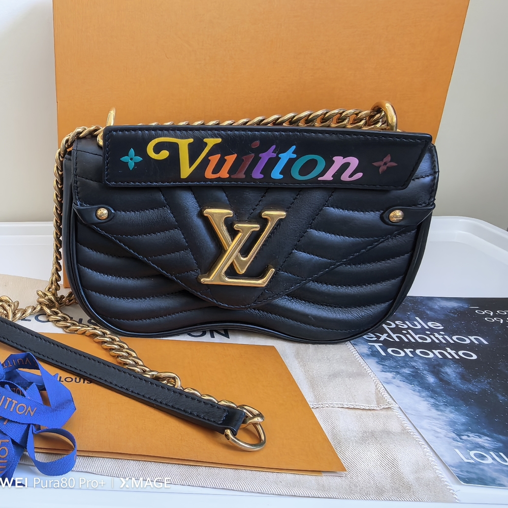 Louis Vuitton Black Quilted Crossbody Bag with Gold Accents